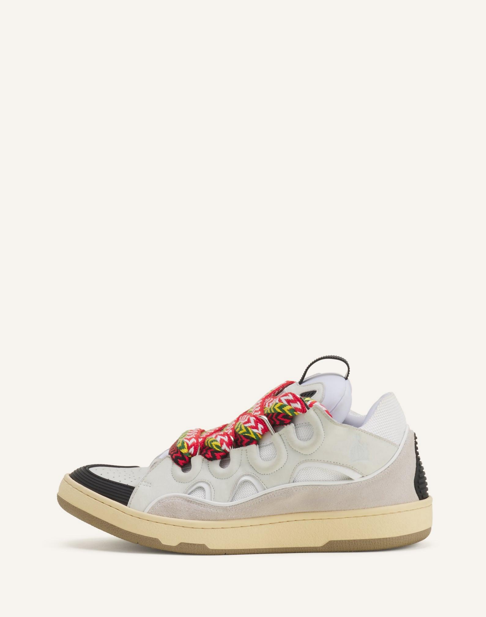 LEATHER CURB SNEAKERS