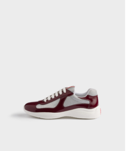 Patent leather and technical fabric Prada America's Cup sneakers 1,270.00 CAD